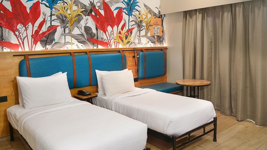 Twin beds in Cozy Twin Room at Indie Stays Resort, Goa.